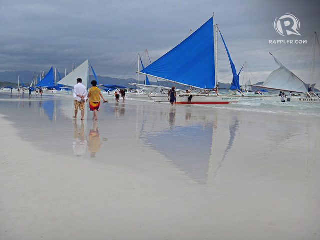 MIRRORLIKE. When washed by waves, Boracay’s tightly packed fine sand assumes a smooth, mirrorlike sheen. Photo by Rhea Claire Madarang 