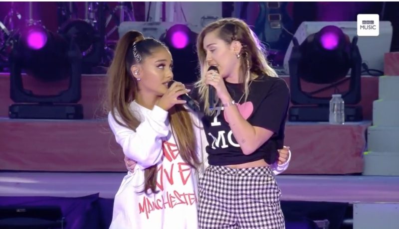 MILEY AND ARIANA. Ariana Grande and Miley Cyrus reunite to perform 'Don't Dream It's Over.' Screengrab from YouTube/Ariana Grande  