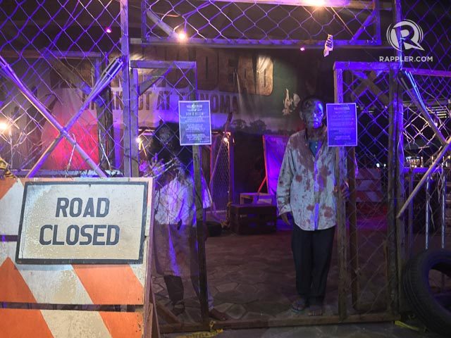 OPEN FOR BUSINESS. Two zombies greet guests at Breakout: The Walking Dead Real Life Escape Room. Photo by Vernise L. Tantuco/Rappler.com 
