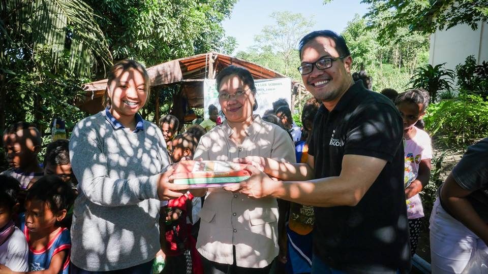 Teachers Mercy and Liwanag formally receive the much-needed textbooks   