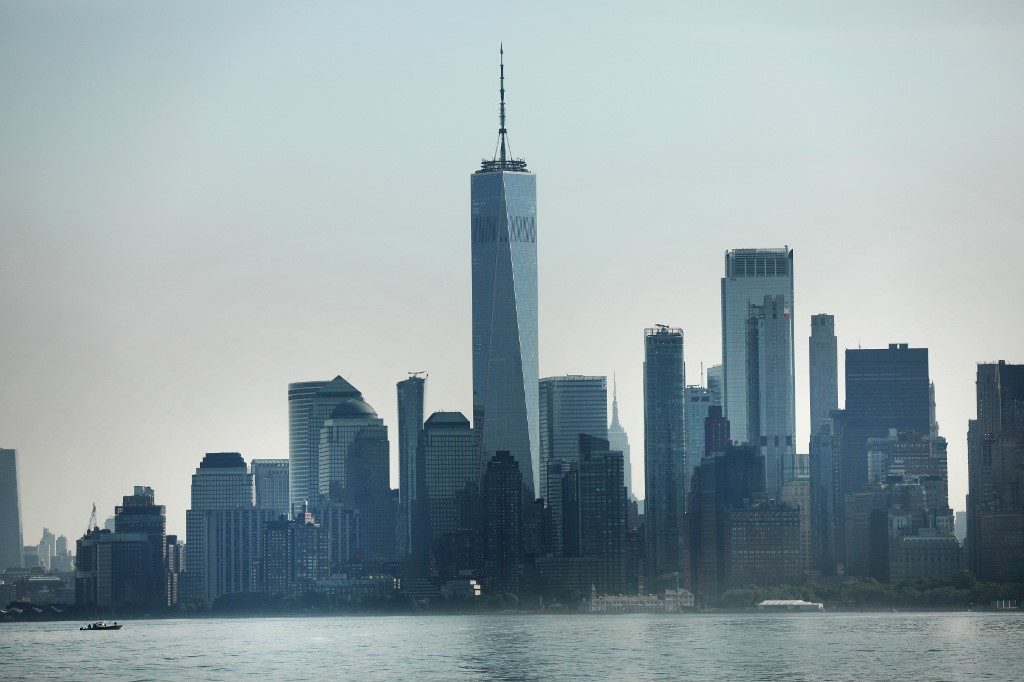 BUSINESS HUB. Manhattan stands in the distance on July 6, 2020, as seen from the Staten Island Ferry in New York City. Photo by Spencer Platt/Getty Images/AFP 
