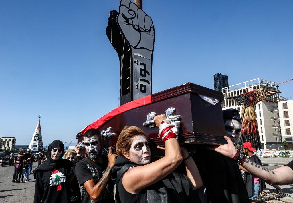 PROTEST. Lebanese anti-government protesters take part in a symbolic funeral for the country in the downtown area of the capital Beirut, on June 13, 2020, on the 3rd consecutive day of demonstrations due to a deepening economic crisis. Photo by Anwar Amro/AFP 