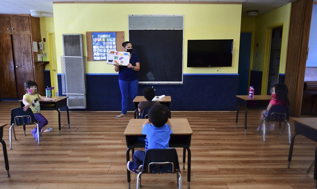 Parents face dilemma as U.S. schools seek to reopen
