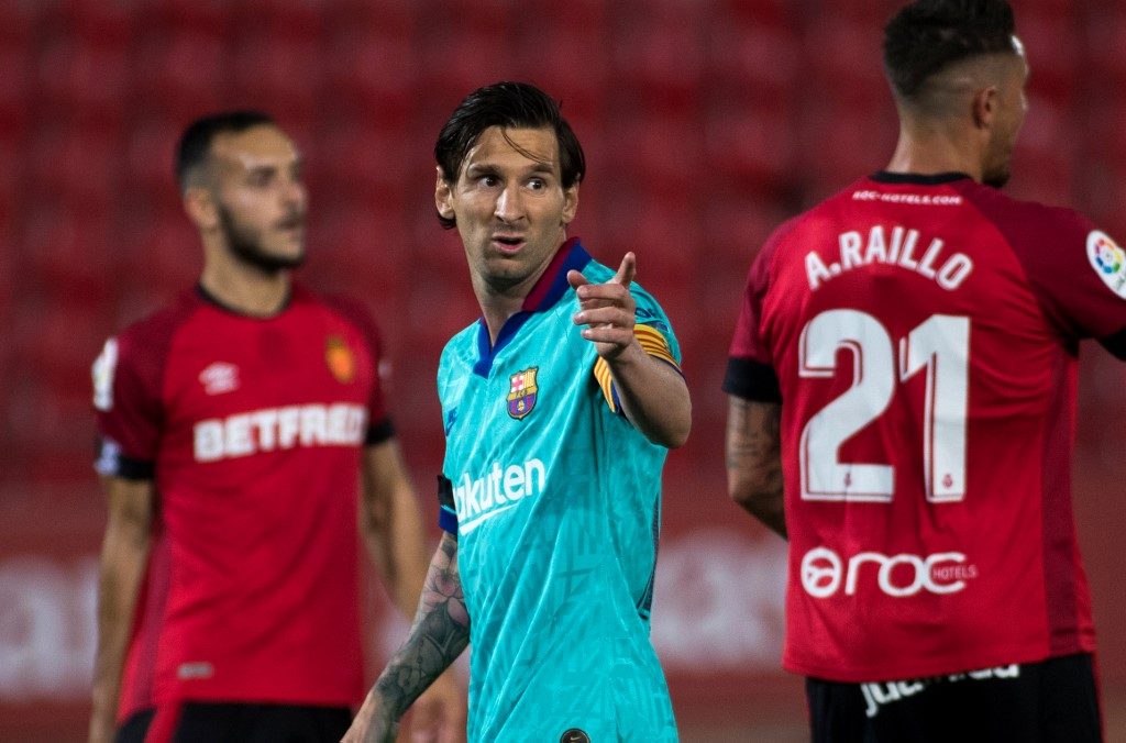 Messi caps Barcelona win over Mallorca on La Liga return