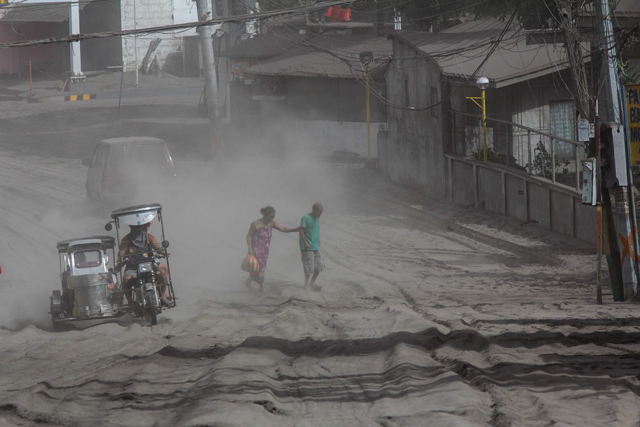 More than 24,000 people flee as Taal Volcano spews ash, lava