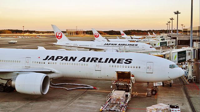 Japan Airlines cuts profit forecast more than 40% as virus bites