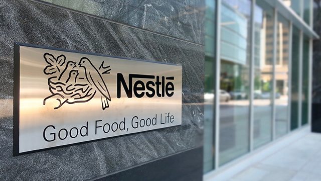 Virus stockpiling, divestment boost Nestle results