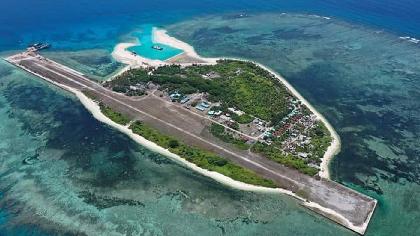 PAG-ASA ISLAND. Construction projects on Pag-asa Island are seen on the upper left portion of this aerial photo. Photo courtesy of the Municipal Engineering Office of the Kalayaan Island Group 