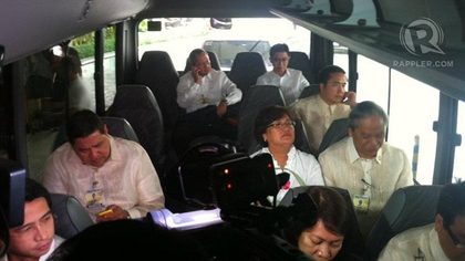 COASTER RIDE. Members of the House prosecution panel inside the coaster that will take them to the Senate for the impeachment trial of Chief Justice Renato Corona, Jan. 16, 2012. Photo by Carmela Fonbuena.