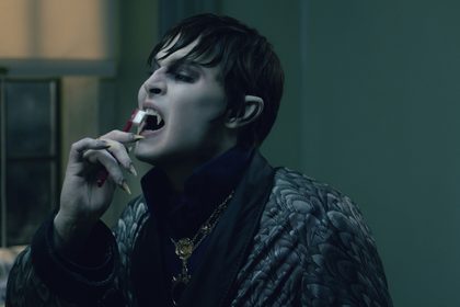 BRUSHING IS GOOD. Johnny Depp as Barnabas Collins puts some fluoride on them fangs. All photos from Warner Bros. 