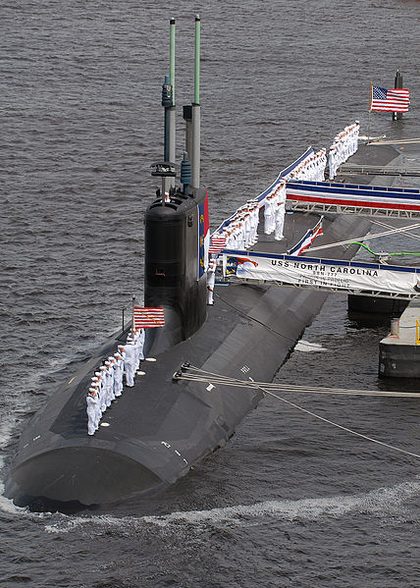 USS NORTH CAROLINA. In this file photo, Sailors "man the ship" and officially bring the newest Virginia-class nuclear attack submarine USS North Carolina (SSN 777) to life during her commissioning ceremony, May 3, 2008, at Wilmington, North Carolina, United States. U.S. Navy file photo By Mass Communication Specialist 3rd Class Kelvin Edwards.