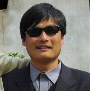This picture taken on March 28, 2005 shows blind activist Chen Guangcheng outside a house in Dondshigu village, in northeast China's Shandong province. AFP PHOTO / FILES