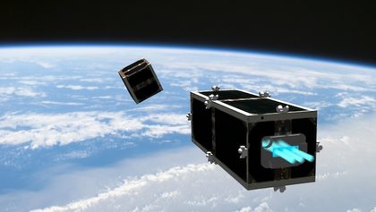 DEBRIS CLEANUP. Artist's rendition of CleanSpace One chasing its target, one of the CubeSats launched by Switzerland in 2009 (Swisscube-1) or 2010 (TIsat-1). Photo courtesy of EPFL/Swiss Space Center