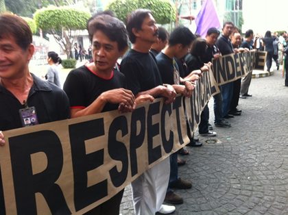 RESPECT. Court employees call for respect of judicial independence on day impeachment trial vs chief justice Renato Corona starts. Photo by David Santos