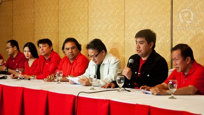 IN FIGHTING FORM. Defense lawyers of Chief Justice Renato Corona are in red attire during a surprise Sunday evening press briefing. Photo by Michael Josh Villanueva