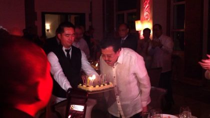 BIRTHDAY BOY. Former President Joseph Estrada blows out his candles on his 75th birthday celebration. April 16, 2012. Natashya Gutierrez.