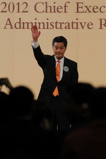 NEW LEADER. Hong Kong chief executive elect Leung Chun-ying waves after being announced as the winner of the Hong Kong chief executive election on March 25, 2012. Photo by AFP