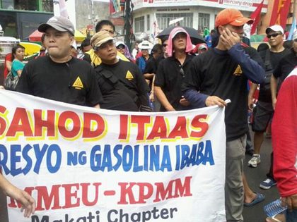 WAGE INCREASE. Workers took to the streets of Manila to demand higher wages. Photo by Lady Anne Salem