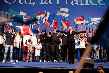 OUI, LA FRANCE. French presidential candidate Marine Le Pen gestures to the crowd at a political rally of the far-right Front National party in Zenith in Paris, April 17, 2012. Photo by the Marine Le Pen campaign