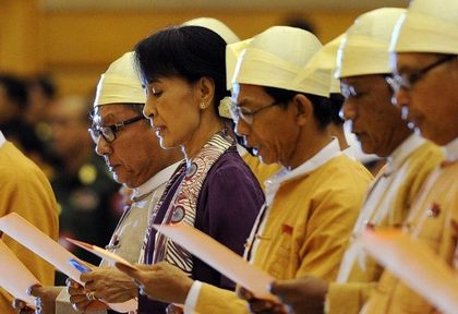 MP SUU KYI. Myanmar opposition leader Aung San Suu Kyi (2nd L) along with other elected members of parliament reads her parliamentary oath at the lower house of parliament during a session in Naypyidaw on May 2, 2012. Photo by Soe Than Win, AFP