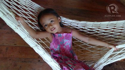 BEAUTIFUL EYES, AREN'T THEY? The author's daughter, Patris, unaware of her skin color, glows with the serenity of a child. Photo from Nikka Santos