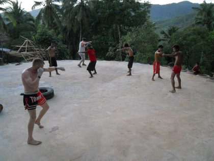 Tom conducting an Inner Warriorship class with residents of Bacungan.