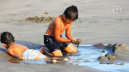 KIDS AT PLAY. Bagasbas is not just a haven for future surfers, but for children and families as well. Photo by Izah Morales.