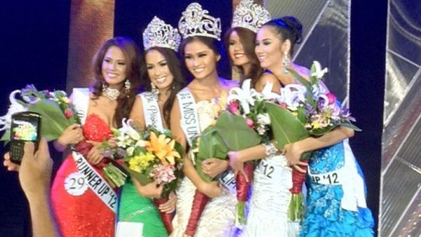 LOOKS FAMILIAR? Newly crowned 2012 Binibining Pilipinas-Universe Janine Tugonon (center) Photo by Veejay Floresca