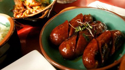 WITH A TWIST. Maharlika, a popular Pinoy resto in New York, gets creative with longganisa to cater to the American taste. Photo by Carlos Santamaria